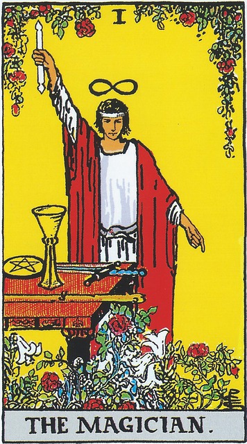 Major Arcana Tarot Car 1 - The Magician
The Magician, in red and white, stands at an altar, one raised hand holding a wand, pointing at the sky, the other pointing to the ground, symbolic of the marriage of the divine (inspiration) and the earth (the work to make it happen). Above his head is the Infinity symbol ∞, indicating infinite potential, power, and options. Around his waist is a snake eating its tail, also known as an ouroboros, another sign of infinity. On the altar before the Magician sits symbols representing the suits in the tarot deck: cups, wands, swords, and pentacles, which, in turn represent all 4 elements, water, fire, air, and earth, representing wholeness – all the tools necessary for creation.
